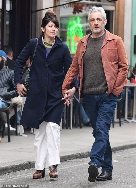 The Bill stars Caroline Catz and Michael Higgs look loved-up on a stroll trends now