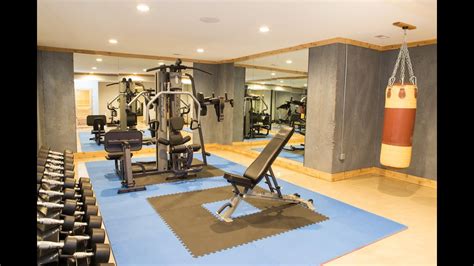 This Basement Has it All: Home Gym, Bar, and a Secret - YouTube