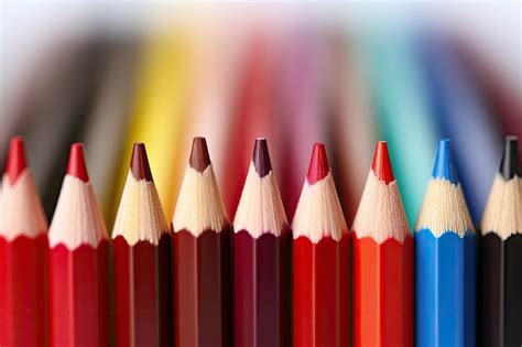 Premium AI Image | Red pencil dominates a spectrum of color pencils