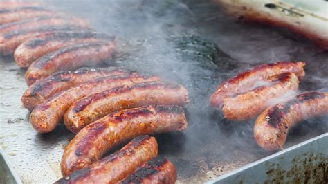 Roasting sausages food in a Calabrian party 37765110 Stock Video at Vecteezy