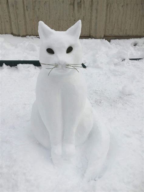 Snow cat | Sculpture, Outdoor decor, Outdoor