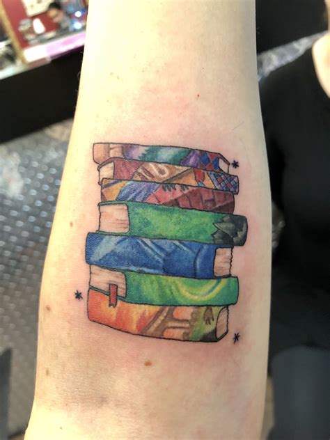 Harry Potter book spines tattoo | Geek tattoo, Book tattoo, Tattoo design book