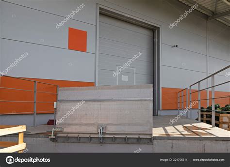 Loading Dock Ramp Up Stock Photo by ©Baloncici 321705314