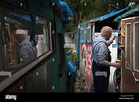 man paints at faslane peace camp in scotland Stock Photo - Alamy