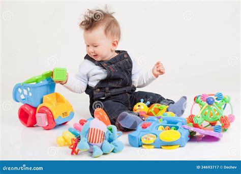 Happy Baby Playing With Toys Stock Image - Image of person, activity: 34693717