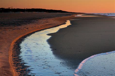 Sand And Surf Photograph by Steven Ainsworth - Pixels