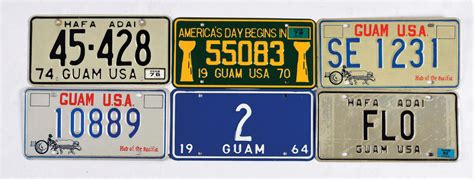 Lot Detail - LOT OF 11: GUAM & AMERICAN SAMOA LICENSE PLATES.