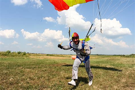 Parachute Landing Stock Photos, Pictures & Royalty-Free Images - iStock