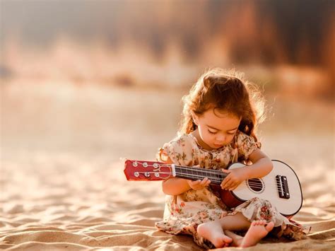 Sweet Girl Playing Guitar