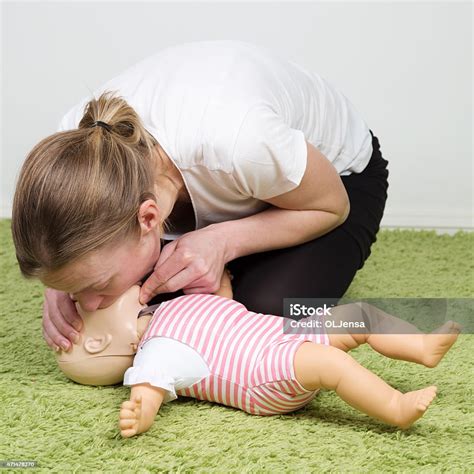 Infant Cpr Breathing Stock Photo - Download Image Now - CPR, Baby ...