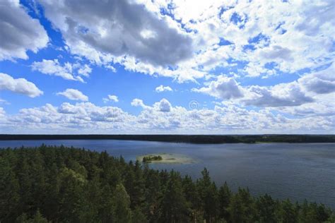 Pine Forests Surrounding a Lake with an Island Stock Photo - Image of cloud, national: 141675072