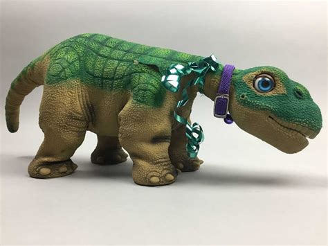 Lot 383 - A PLEO ROBOTIC DINOSAUR TOY ALONG WITH