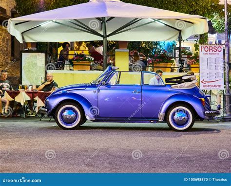 VARENNA, ITALY - AUGUST 6, 2017: Vintage Purple Volkswagen Beetle Convertible in Varenna, Italy ...