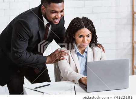 Sexual harassment at workplace. African... - Stock Photo [74122191] - PIXTA