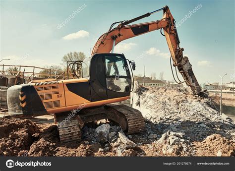 Images: excavator breaker | Hydraulic breaker hammer excavator at demolition work — Stock Photo ...