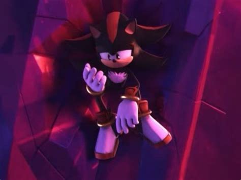 sonic the hedgehog is sitting down in front of a red and purple wallpaper
