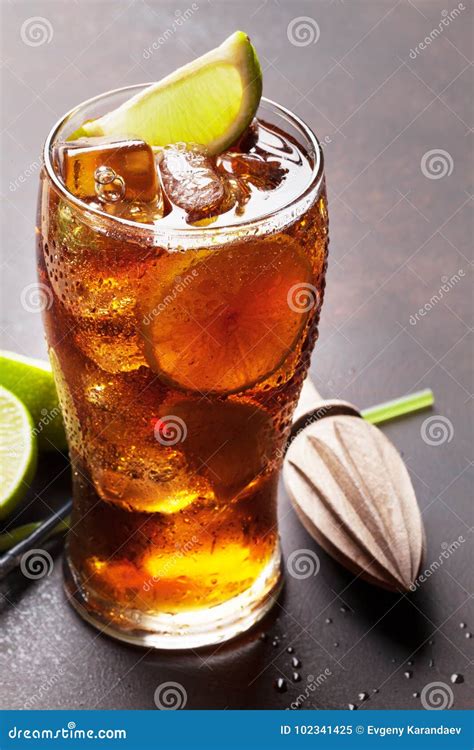 Cuba libre cocktail glass stock image. Image of liquor - 102341425