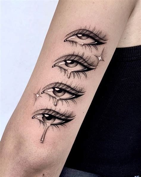 Crying Eyes Girl's Arm Tattoo