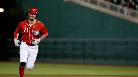 Cincinnati Reds cut 11 players from camp, promote Jonathan India