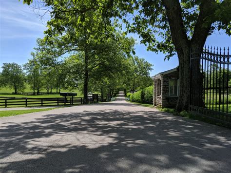 Entrance to Claiborne Farm Paris, KY - No Home Just Roam