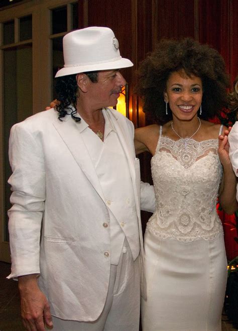 Cindy Blackman and Carlos Santana at their wedding reception. Cindy's gown was made ...