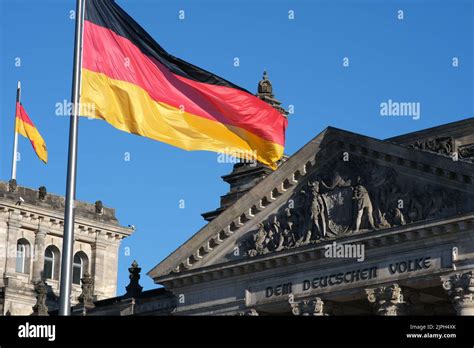 german flag, reichstag building, german flags Stock Photo - Alamy