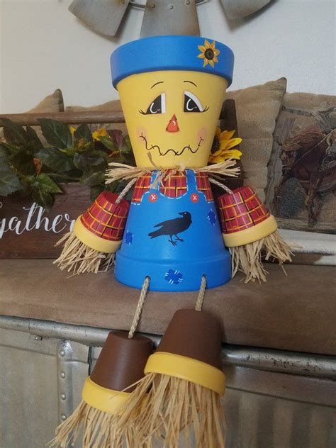 Scarecrow is made of two 6 terra cotta clay pots for his body and four ...