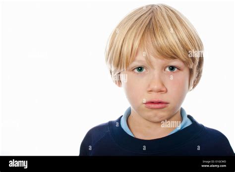 School boy with a sad face Stock Photo - Alamy