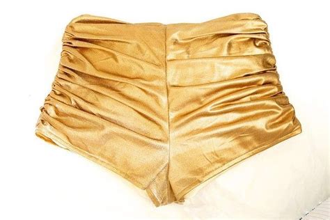 Kylie Minogues famous gold hotpants. | Womens shorts, Fashion, Kylie ...