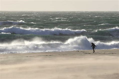 Perth storm hits with force as fierce cold front cuts power to 55,000 homes in WA's south-west ...