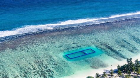 Swimming Pool in Sea stock photo. Image of lagoon, happy - 107015218