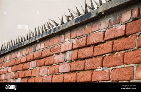 A close up of metal spikes on top of a brick wall in Hartlepool,England ...