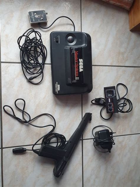 1 Sega master system II - Console with games - Without - Catawiki