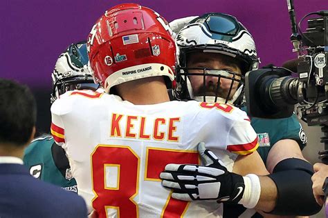 Travis and Jason Kelce Share Hug on the Super Bowl Field