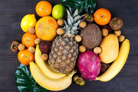 Tropical fruits background, many colorful ripe tropical fruits – JAIMEMONSAP