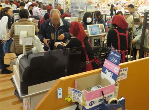 Japan Supermarket Two People Checkout | AllAboutLean.com