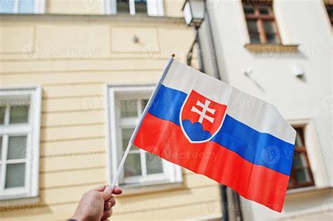 Flag of Slovakia in hand against street of Bratislava. 11728216 Stock ...