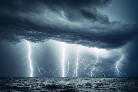 Premium Photo | Lightning flash and thunderstorm over ocean