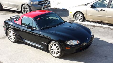 Black miata with Red hardtop