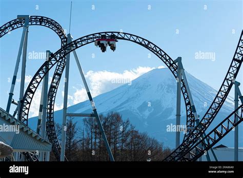 Takabisha World's Steepest Roller Coaster. Background with Mount Fuji and beautiful blue sky ...