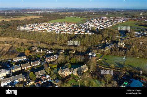 Aerial panoramic view of Calderwood housing development on the edge on East Calder village, West ...