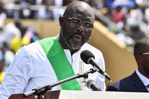 Liberian President Weah Pledges Salary Cut as Economy Stutters - Bloomberg