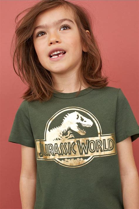 T-shirt with Printed Motif - Dark green/Jurassic World - Kids | H&M US | Universal shirts, Kids ...
