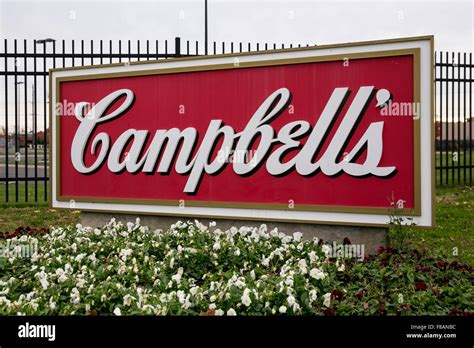 A logo sign outside of the headquarters of The Campbell Soup Company ...