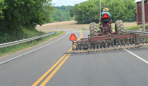 Slow Moving Vehicle sign saving lives for 50 years - Farm and Dairy