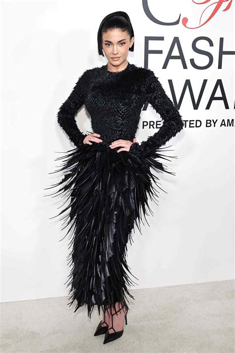 Kylie Jenner Rocks Feathery Black Dress and New Hair Look at 2024 CFDA ...