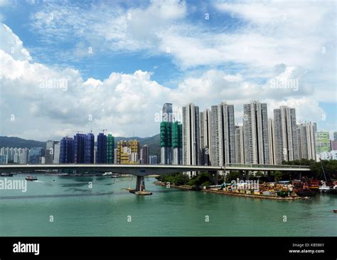 The South Island MTR train crossing the Ap Lei Chau bridge in Hong Kong ...