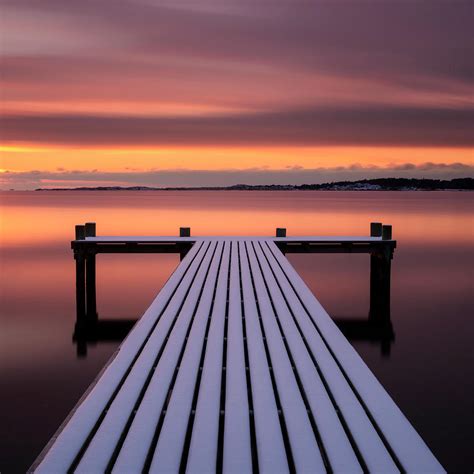 Jetty At Sunset by Johner Images