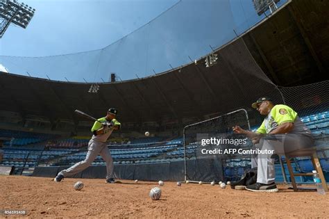 Players of the Venezuelan baseball team Leones del Caracas attend a ...