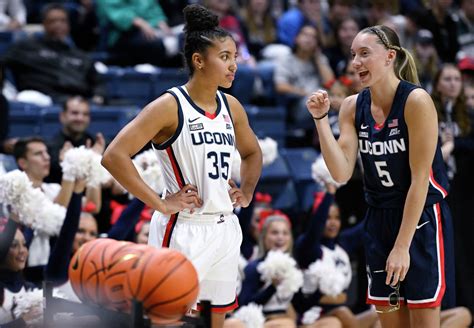 Azzi Fudd scores 26 points as UConn defeats Northeastern.